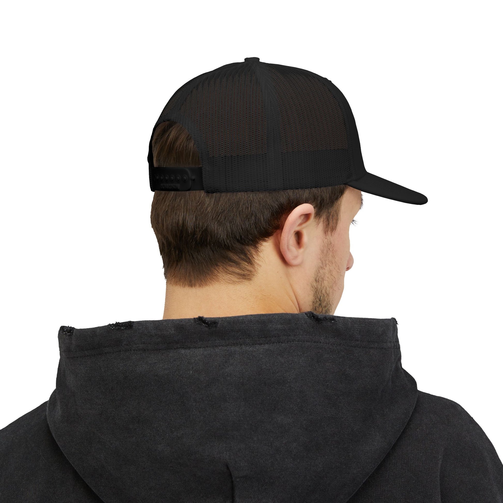 Man wearing the MWO trucker cap, back view showing the mesh back and snapback strap