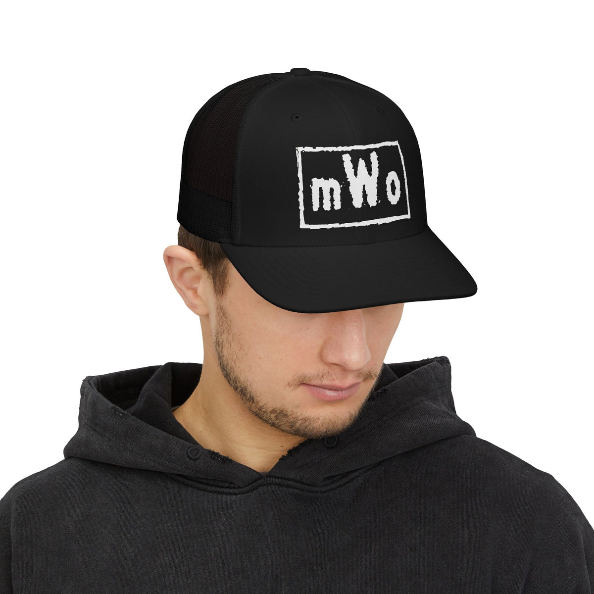 Man wearing the MWO black trucker cap, front view